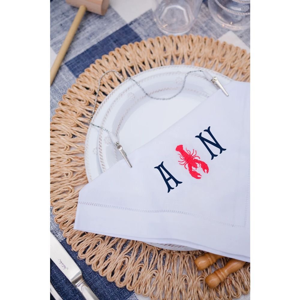 The Monogram Mary Lobster kit turns napkins into lobster bibs